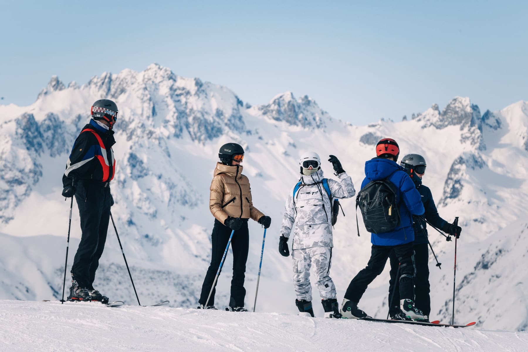 Skiers of all ages on a family piste in Courchevel